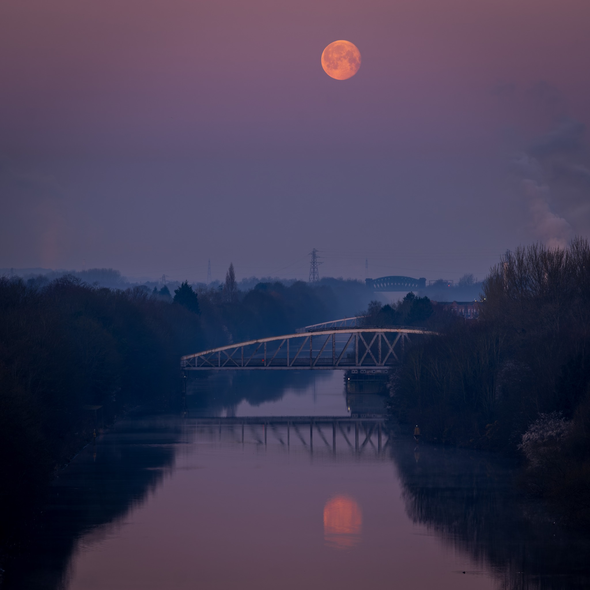 Moon setting across the Manchester Ship Canal